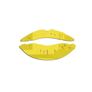 Macro detail of yellow mirror acrylic lip wall sticker with self-adhesive backing