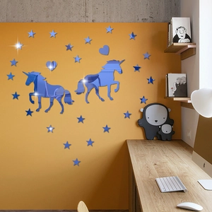 Blue acrylic mirror wall stickers with unicorn hearts and stars on a yellow wall