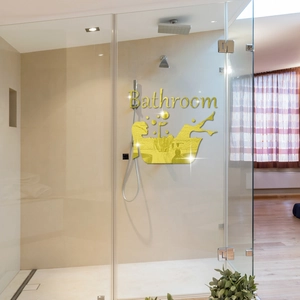 Golden acrylic mirror wall sticker for bathroom featuring a figure in bathtub and text