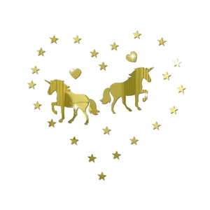 Macro view of gold mirror acrylic unicorn and star wall stickers with reflective finish