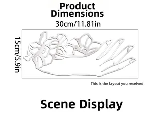 Sticker mural miroir argenté motif floral et main avec dimensions de 30x15 cm