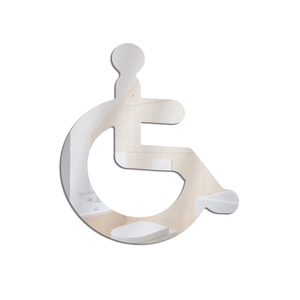 Close-up of disabled wheelchair sign mirror showing clear reflection in a bathroom setting