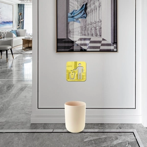 Minimalist beige cylindrical trash can with a matte finish for modern interior decor