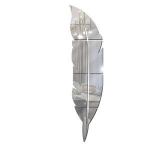 Macro detail of feather mirror wall stickers showing high reflective acrylic finish