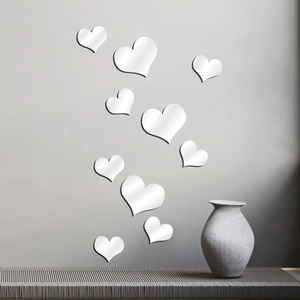 Set of 10 silver mirror acrylic heart wall stickers in various sizes for home decor