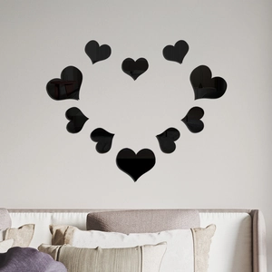 11-piece set of black acrylic heart mirror wall stickers arranged in a large heart shape