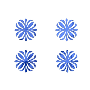Detail of four blue acrylic mirror wall stickers with symmetrical floral petal pattern