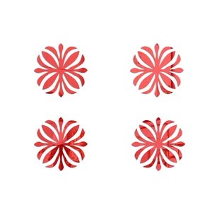 Detail view of red acrylic mirror wall stickers with a symmetrical mandala petal design