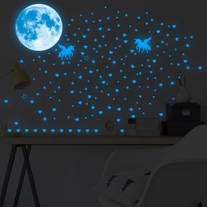 Luminous wall stickers featuring moon unicorns and stars glowing in bright blue light