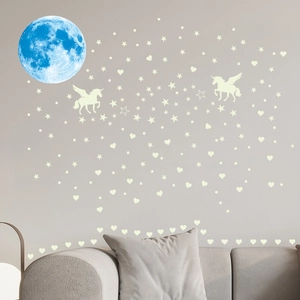 Luminous wall stickers set with blue moon, flying unicorns and glowing stars decoration
