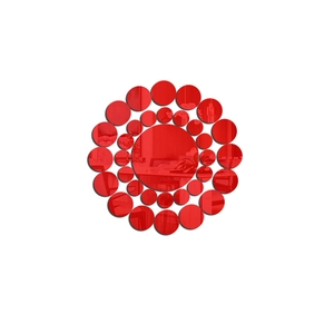 Detail of red circular acrylic mirror wall stickers with reflective surface in mandala pattern