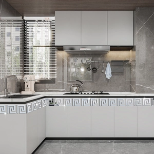 Silver Greek Key acrylic mirror border trim applied to white kitchen cabinet edges