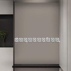 Macro detail of acrylic mirror wall stickers with Greek meander geometric pattern design