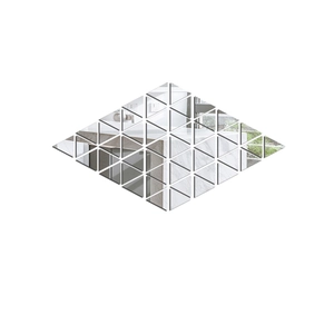 Detail view of triangular acrylic mirror wall stickers forming a large diamond pattern