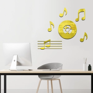Macro shot of 3D musical note wall stickers with golden mirror finish and sharp texture