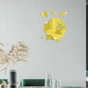 Detailed view of golden acrylic mirror butterfly wall stickers in a modern living room decor