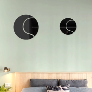 Modern acrylic mirror wall stickers with black circular S-shaped design for bedroom decor