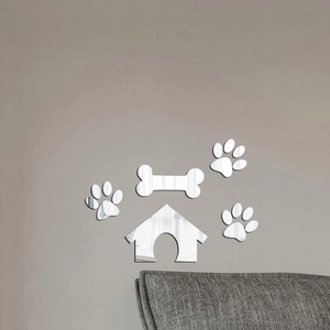 Détail du lot de 5 stickers muraux miroir acrylique niche et pattes sur un mur gris