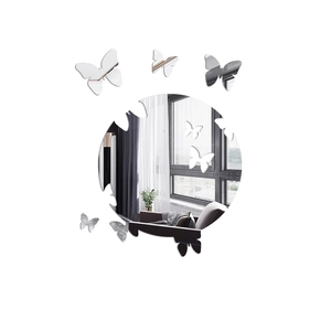 Detailed view of butterfly acrylic mirror wall stickers reflecting a modern living room