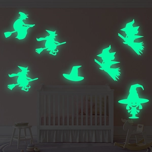 Luminous Halloween wall decals featuring green glowing witches and hats for kids room decor