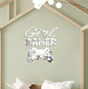 Macro detail of acrylic mirror wall stickers featuring Girl Gamer text and controller shape