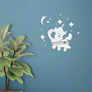 Close-up of silver acrylic unicorn mirror wall stickers with moon and stars for decor