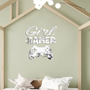 Close-up of silver mirror acrylic wall stickers with GAMER text and controller shapes