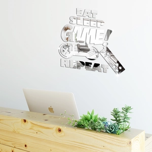 Detail view of mirror acrylic wall sticker featuring game controller and gaming quotes