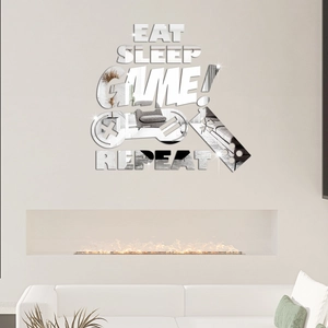 Close-up of Eat Sleep Game Repeat mirrored acrylic wall stickers with gaming controller icons