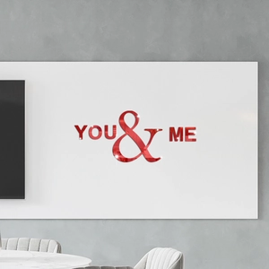 Detail of red acrylic mirror wall sticker featuring YOU & ME letters for living room decor