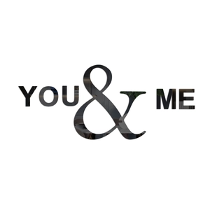 Macro shot of mirror-finish acrylic 3D wall stickers featuring YOU & ME text decoration