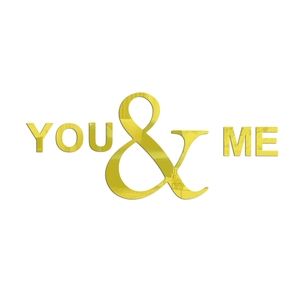 Close-up of golden 3D acrylic mirror wall sticker featuring YOU & ME letters