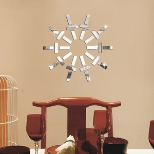 Detail of DIY sunburst acrylic mirror wall stickers showing high reflective silver finish