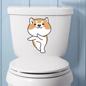 Cute Shiba Inu cartoon sticker applied on a white toilet tank for home decoration