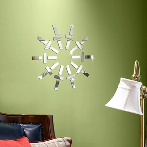 Macro detail of sunburst decorative mirror wall stickers in a bright bedroom setting