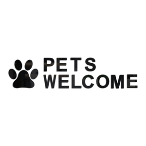 Détail macro du sticker mural 3D Pets Welcome en acrylique noir avec empreinte de patte