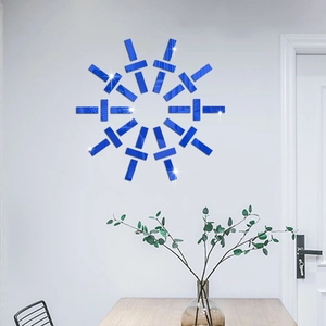 Blue mirror wall stickers in a radial sunburst design for modern living room decor