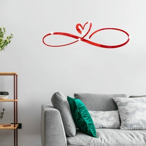 Detail van de rode spiegel infinity hart muursticker in een moderne woonkamer setting