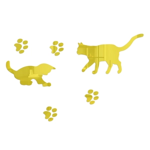 Detail of gold mirror acrylic wall stickers showing cute cat silhouettes and paw prints