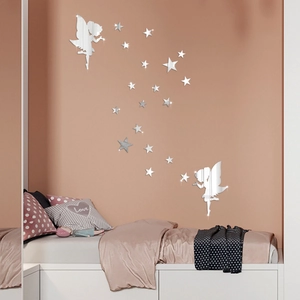 Détail de stickers muraux miroir 3D fée et étoiles sur un mur rose pour chambre
