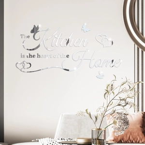 Detail of silver acrylic mirror wall sticker with The Kitchen is the heart of the Home text
