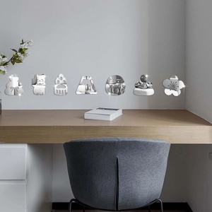 Close-up of Maneki Neko and Fuji acrylic mirror wall stickers on home office wall