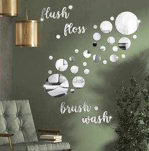 Detail of mirror acrylic wall stickers with Flush Floss Brush Wash words and round dots