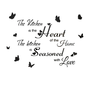 Detail of black acrylic kitchen wall stickers with heart and butterfly motifs