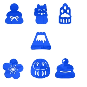 Macro detail of blue acrylic mirror wall decals featuring Japanese Daruma and Fuji motifs