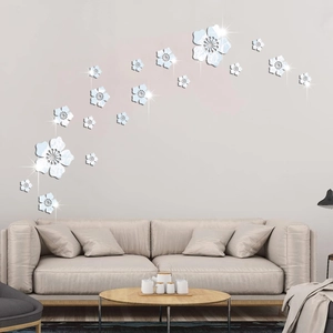 Detailed macro view of 3D light blue mirror acrylic flower wall stickers in various sizes