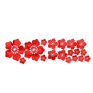 Detail view of 18 red acrylic 3D mirror flower wall stickers with reflective surface