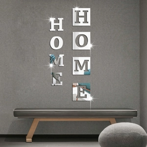 Detail of 3D acrylic mirror wall stickers featuring HOME letters for modern home decor