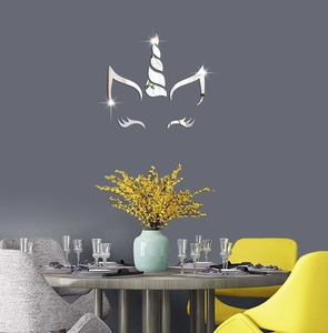 Macro detail of unicorn mirror wall stickers on a modern grey background for home decor
