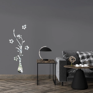 Dettaglio di adesivi murali a specchio in acrilico con design a vaso di fiori minimal